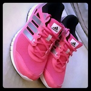 Pink adidas running shoes